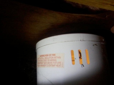 Burn baby burn. Can't anyone read the directions & apply common sense? This uninsulated canned light could have burnt the home down.
