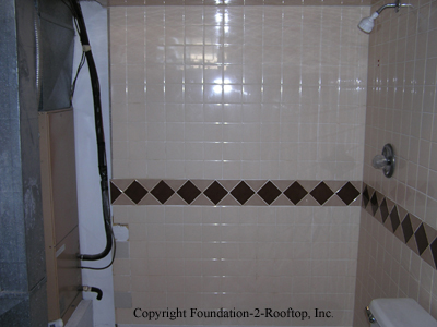 Electrocution hazard with this shower using the 120 amp electric furnace as part of its surround.