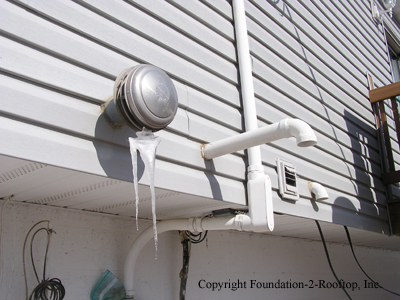 B-vent flue stack improperly installed and dangerous.
