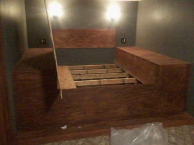 This bed looked great. Buyer sees it as a bedroom that they don't have to buy a bed for. Unbelievable, the extreme the owner went through to cover this grate up.