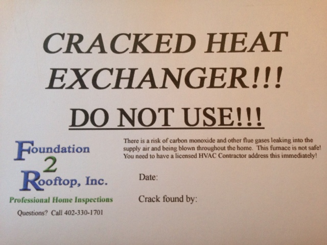 Cracked Heat Exchanger sticker we install on furnaces when we condemn them.